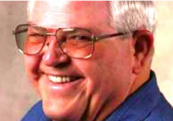 A headshot of Tom Rachal, community member