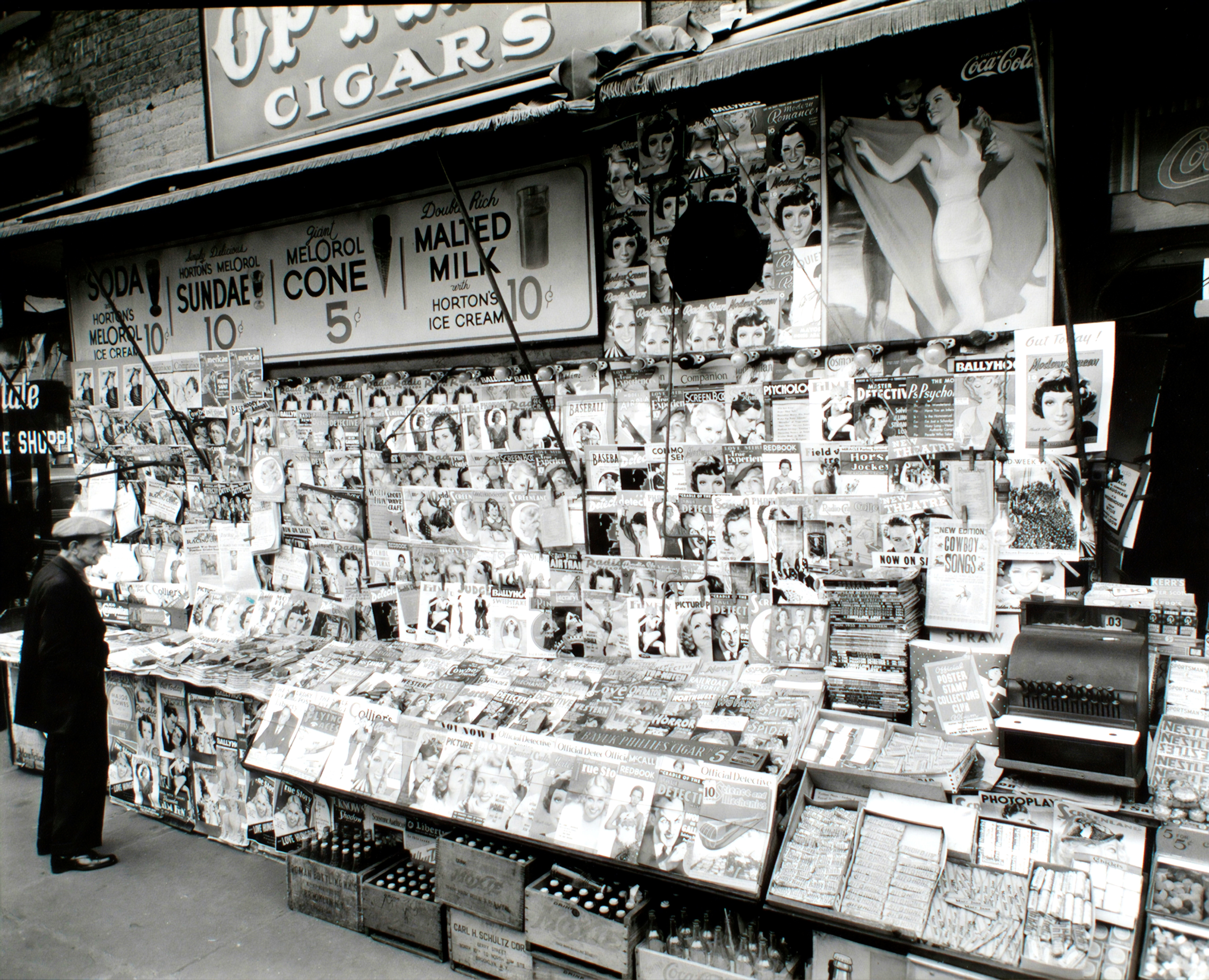A black and white image of a newsstand which is used to represent our Diverse Newspaper Clippings collection